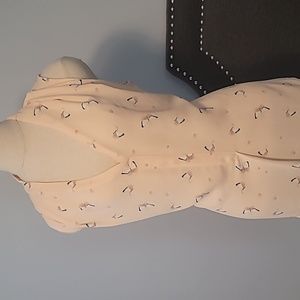 Pleat front sleeveless top